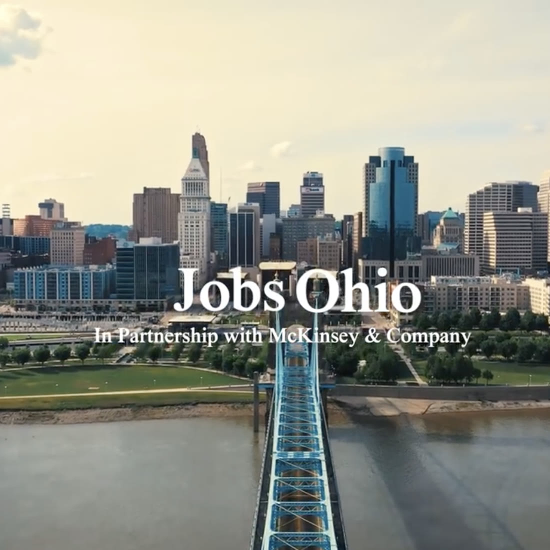 JobsOhio in partnership with McKinsey and Company, aerial view of Cincinnati cityscape and bridge